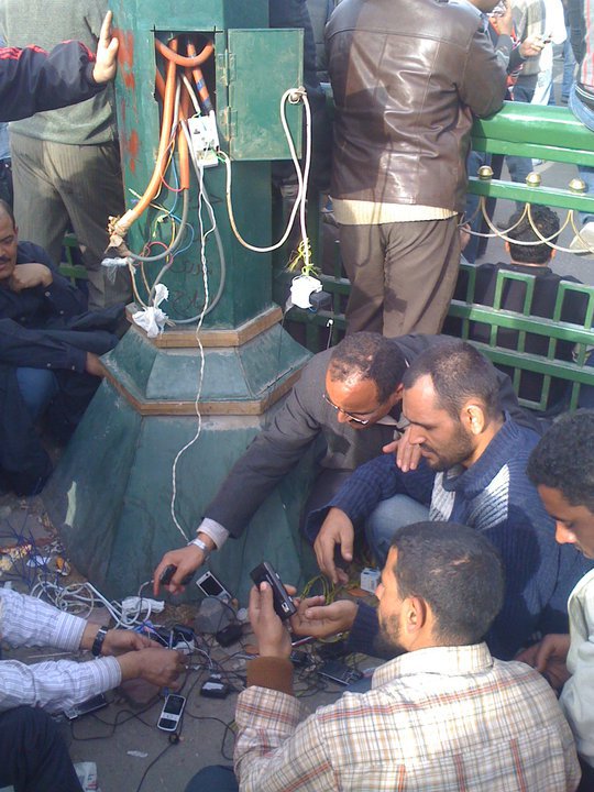 Recharging cellphones in Tahrir Square